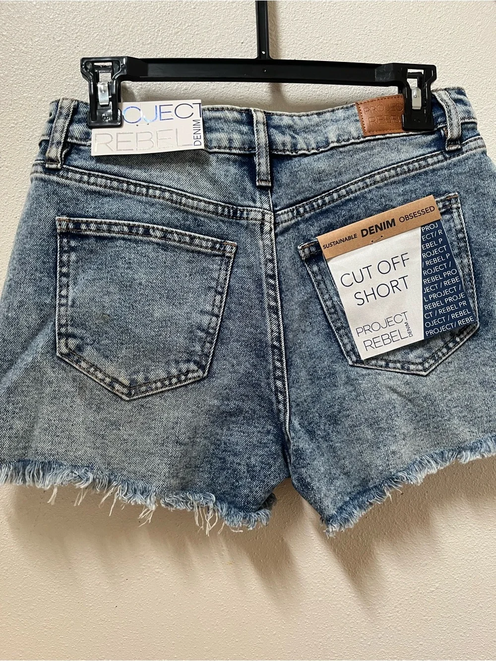CO Light Blue High-Rise Denim Cutoff Shorts with Frayed Hem